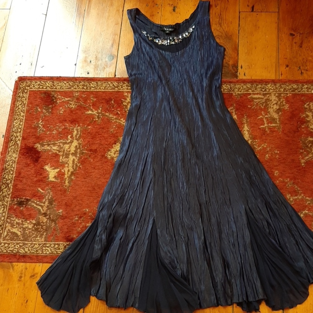 Delicious crinkled navy maxi dress.